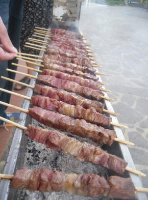 Arrosticini in cottura